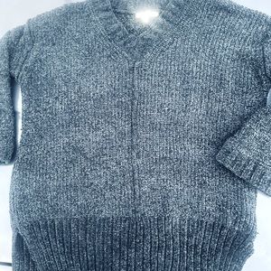 Reborn J women’s quarter length sleeve cashmere sweater.